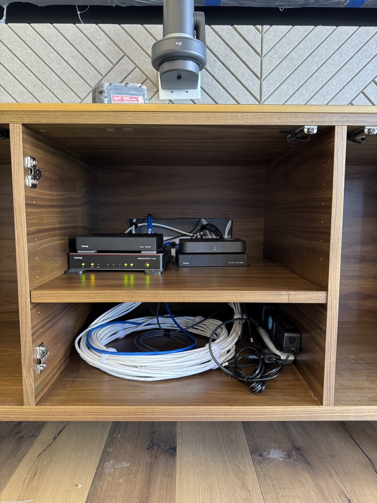 Installed AV equipment inside conference room credenza at Boston Properties