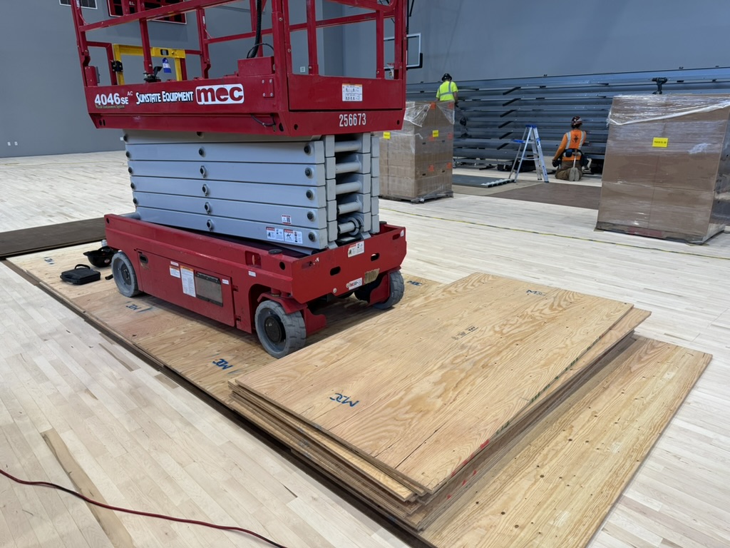Additional plywood floor protection for lift access at Burlingame High School