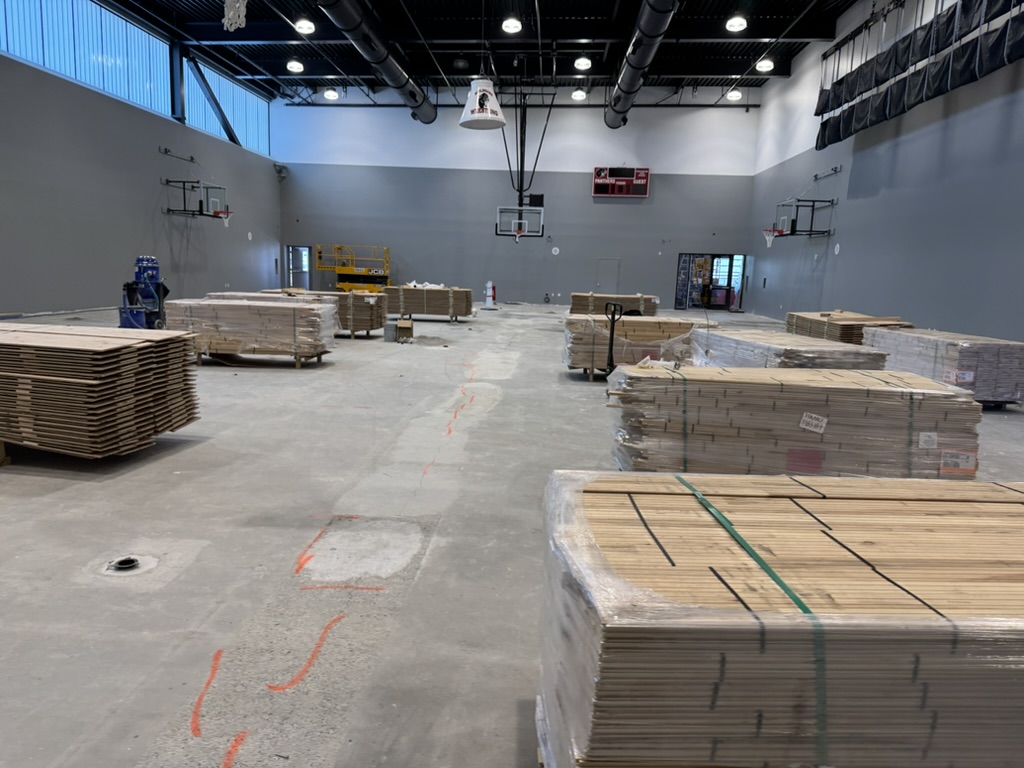 Early main gym work area at Burlingame High School before the finished floor went in