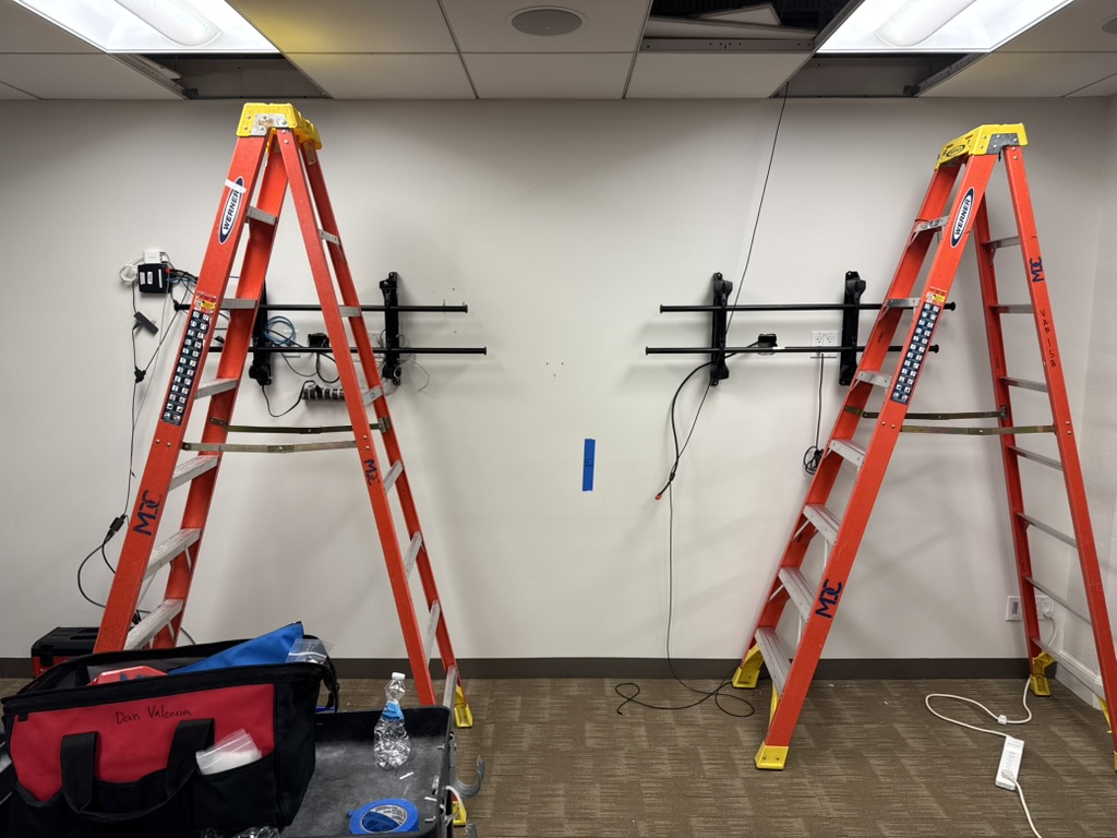 Wall-mount preparation for two displays at the GGRC San Francisco office
