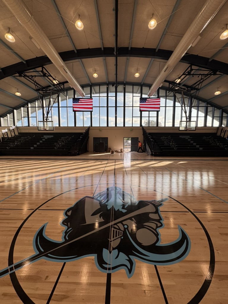 Floor-level wide view of the completed Tennyson High School gym